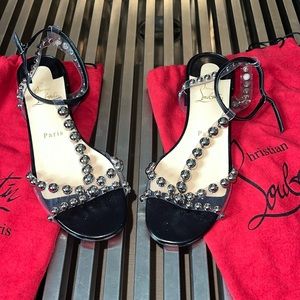 Authentic Christian Louboutin worn once.  size 38. Do not lowball me on these.